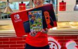 Une Nintendo Switch et le jeu Mario Party